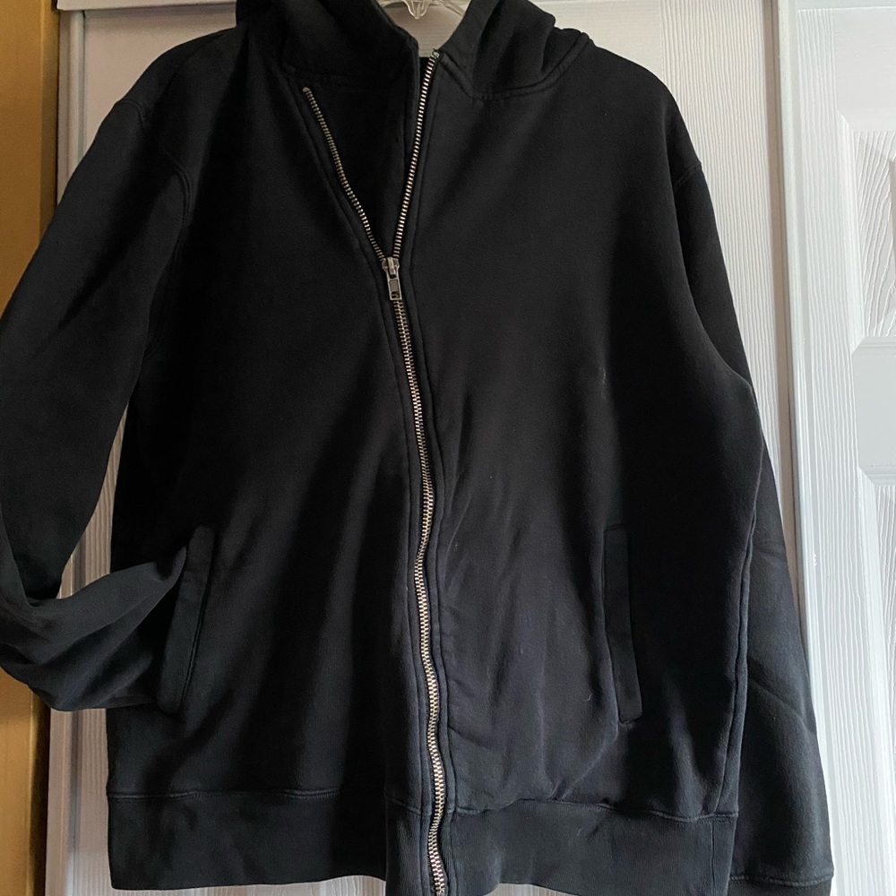 Asymmetric zipper black hoodie.
